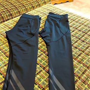Two pairs of Tory Sport black leggings size L